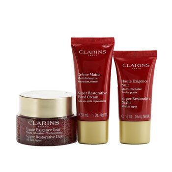 Clarins Super Restorative Collection: Day Cream 50ml + Night Cream 15ml + Hand Cream 30ml + Bag